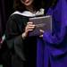 A graduating senior accepts a diploma cover during the Ypsilanti High School Commencement at the Convocation Center on Tuesday, June 4. This is the 164th and final graduating class. Daniel Brenner I AnnArbor.com